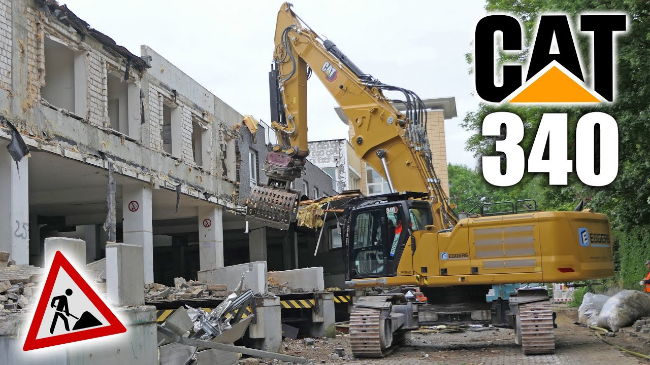 Caterpillar 340 excavator new demolishing machine ripping off main gate