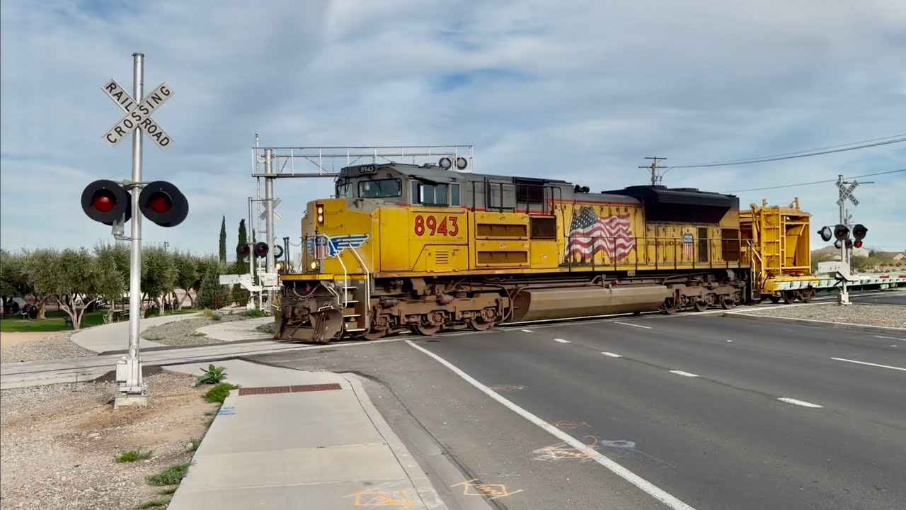 A fast moving UP work train heads westbound through Queen Creek AZ 3-1-26