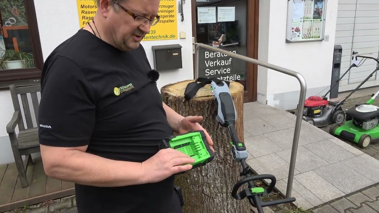 EGO Kehrbesenaufsatz um Wege, Plätze von Schmutz, Moos, hartnäckigen Ablagerungen zu reinigen Test