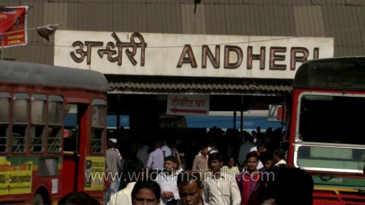 Andheri - Busy Mumbai station, with diesel buses plying on roads