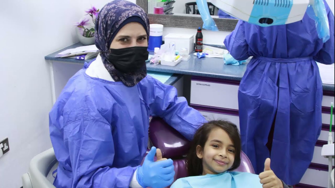 Topical Fluoride for Kids  تطبيق الفلورايد الموضعي في العيادة للأطفال - دكتورة منال أبو زلام