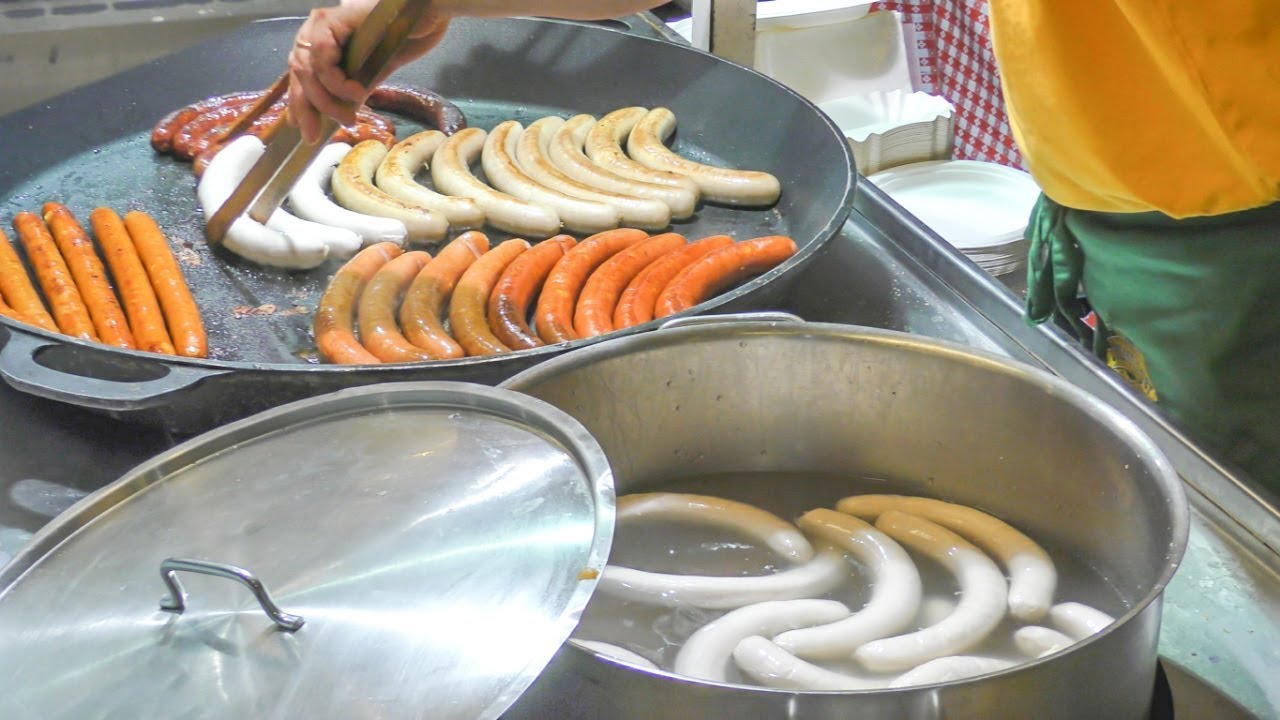 Austria Street Food. Huge Sausages, Meat  and more. Food Fair in Italy