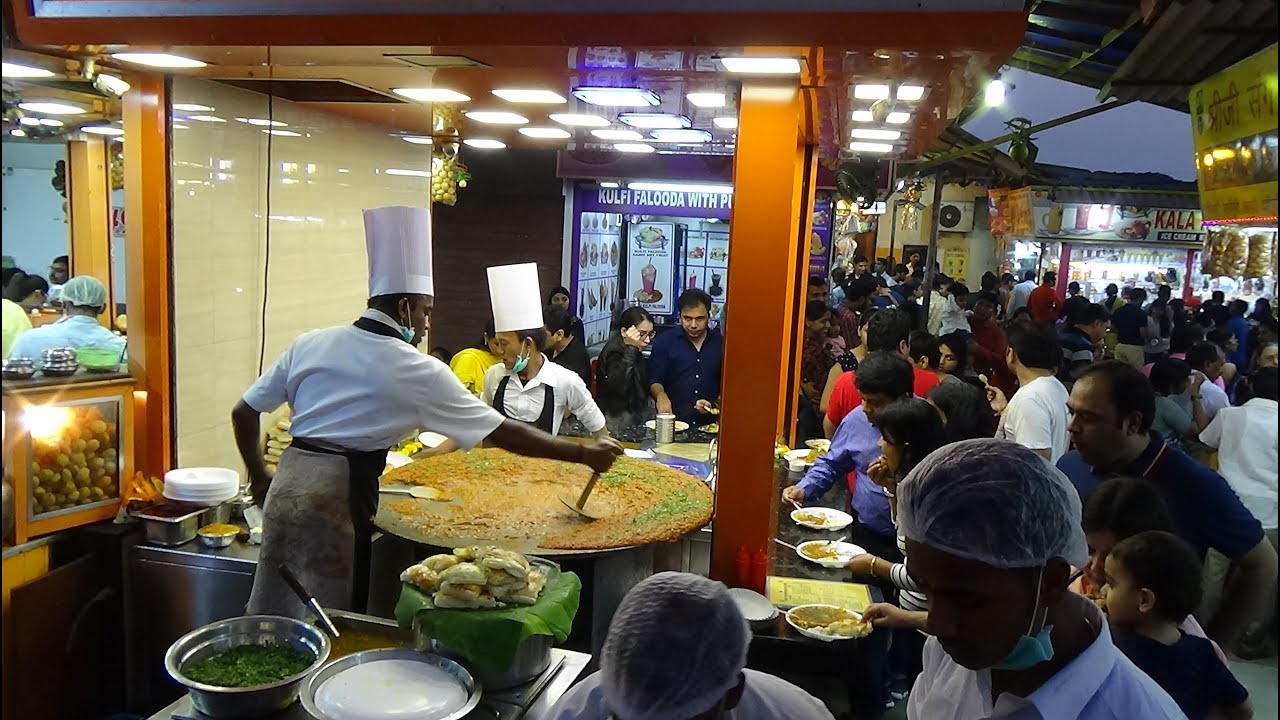 The Pav Bhaji Making Master of Juhu Chowpatty Beach - Delicious Indian Street Food in Mumbai, India.