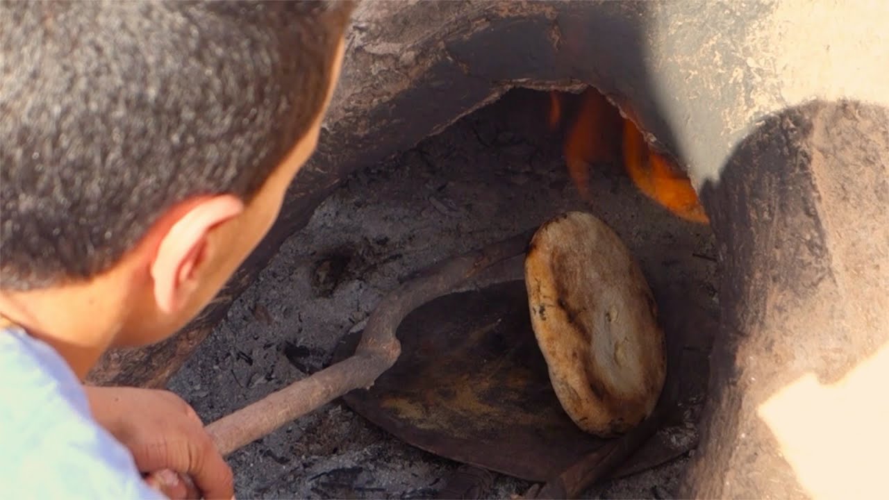 Moroccan bread made in a clay oven / Khobz / Authentic recipe from Sahara