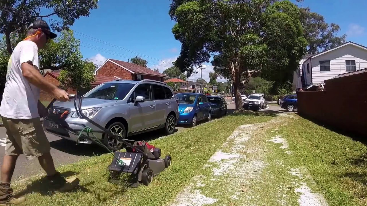 Lawn Mowing & Edging an Overgrown Sidewalk