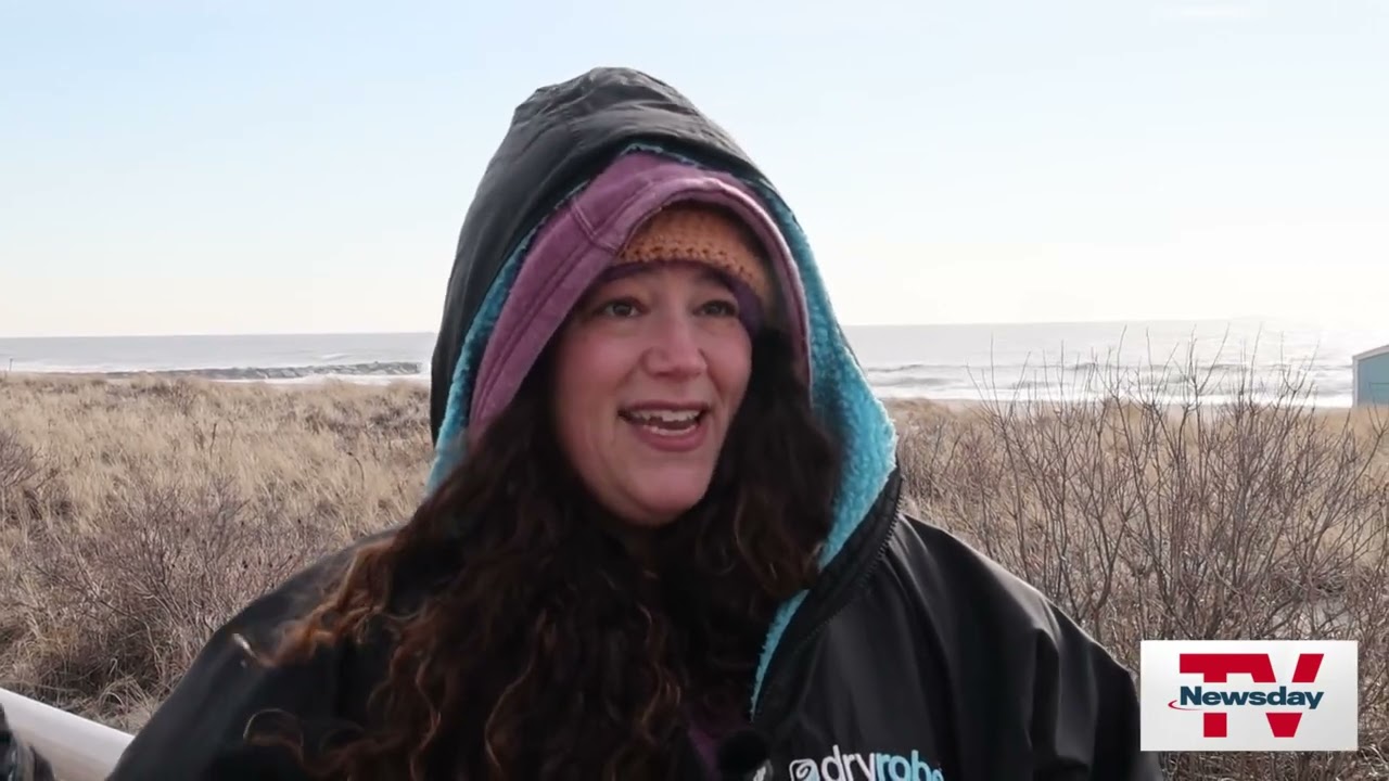 Rain or shine, warm or cold, she takes a dip in the ocean every day