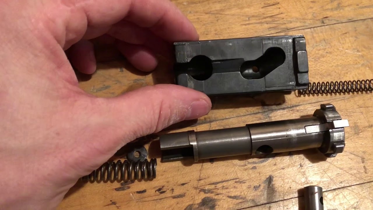 12 Gauge firing pin and bolt disassembly and reassembly