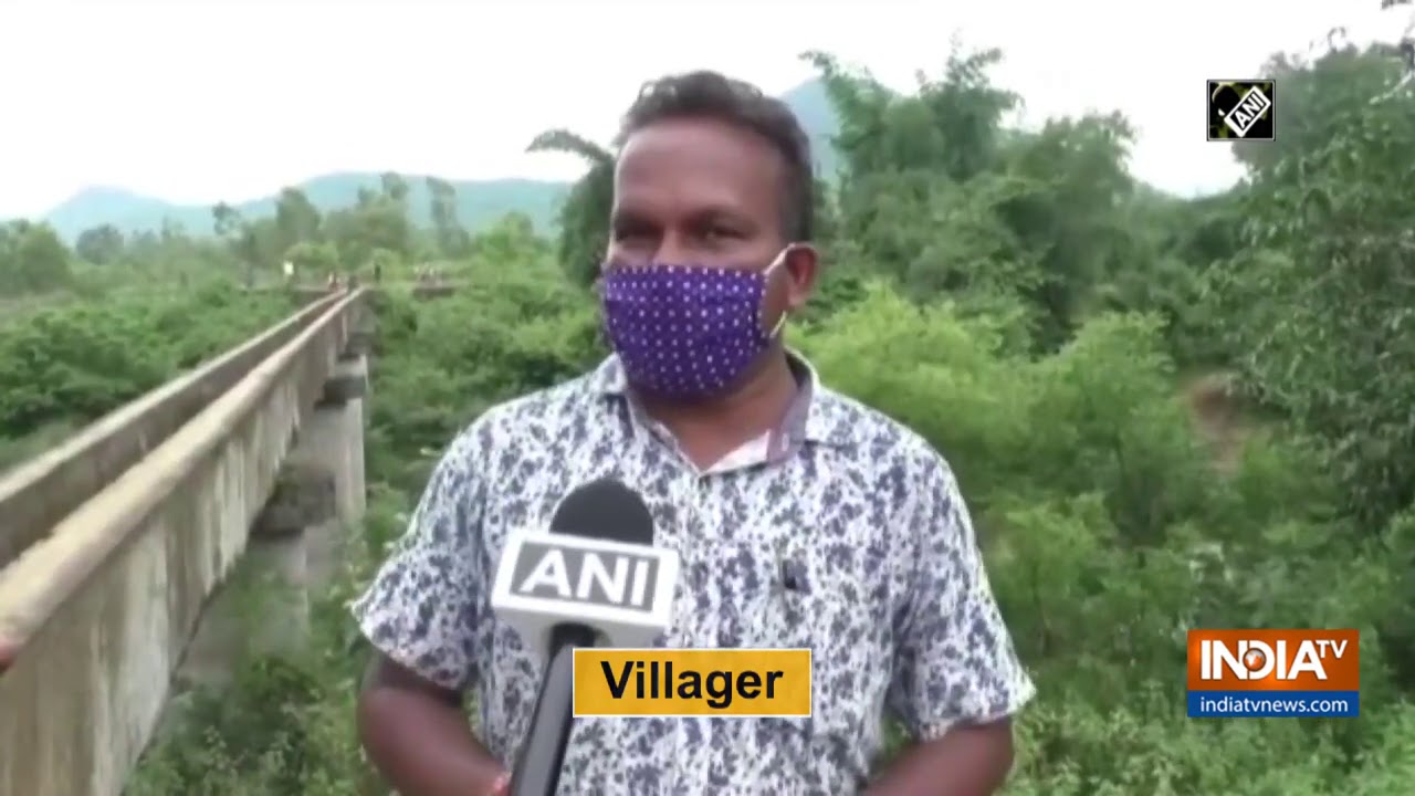 Villagers risk their lives by crossing river on 60-ft-high canal in Odisha's Ganjam
