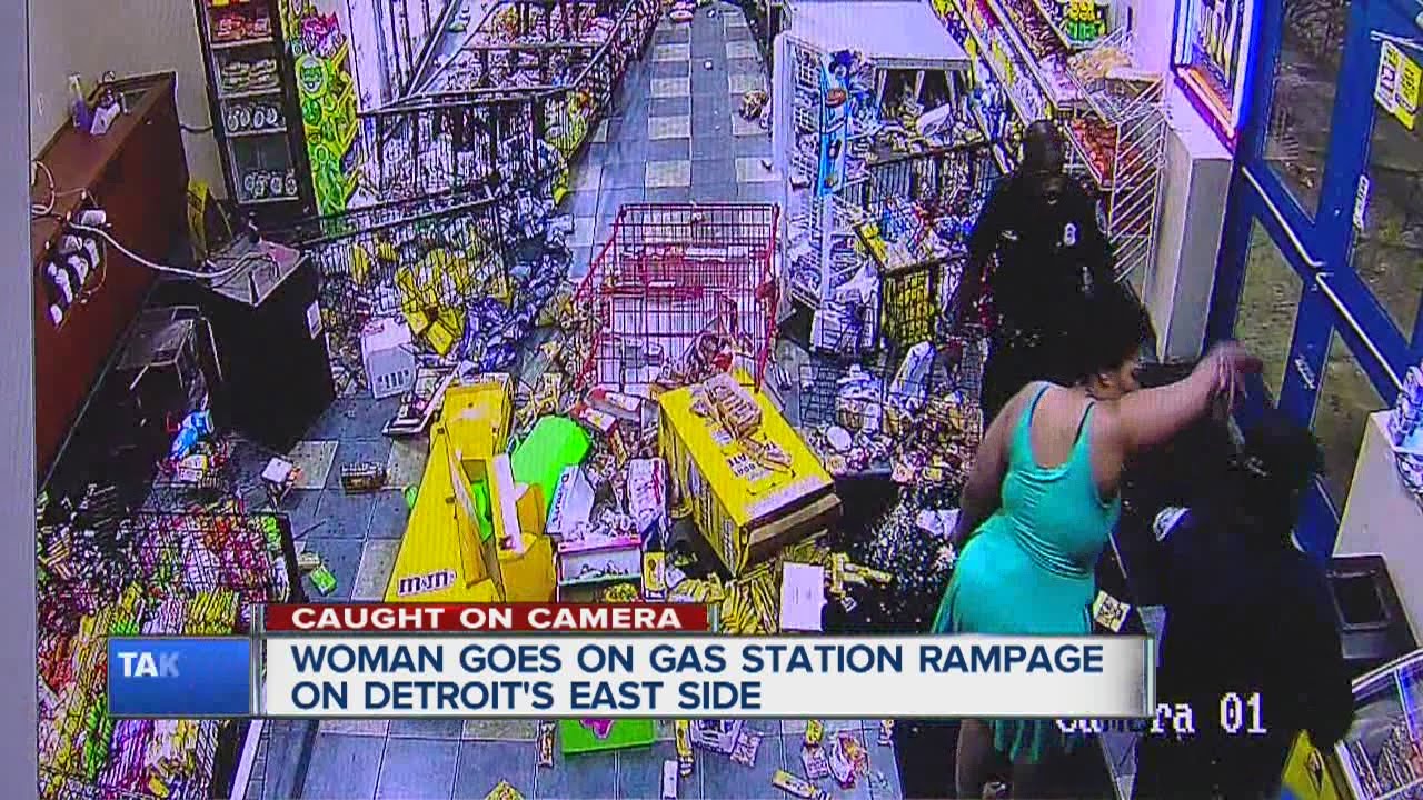 Woman trashes fas station