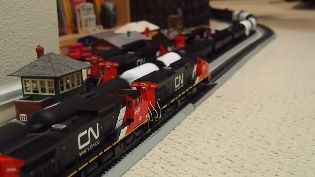 CN Oil train,  Iowa Northern GP40W's, BN