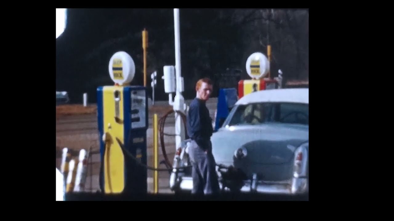 Vintage footage at a retro gas station. 1950's P A M 