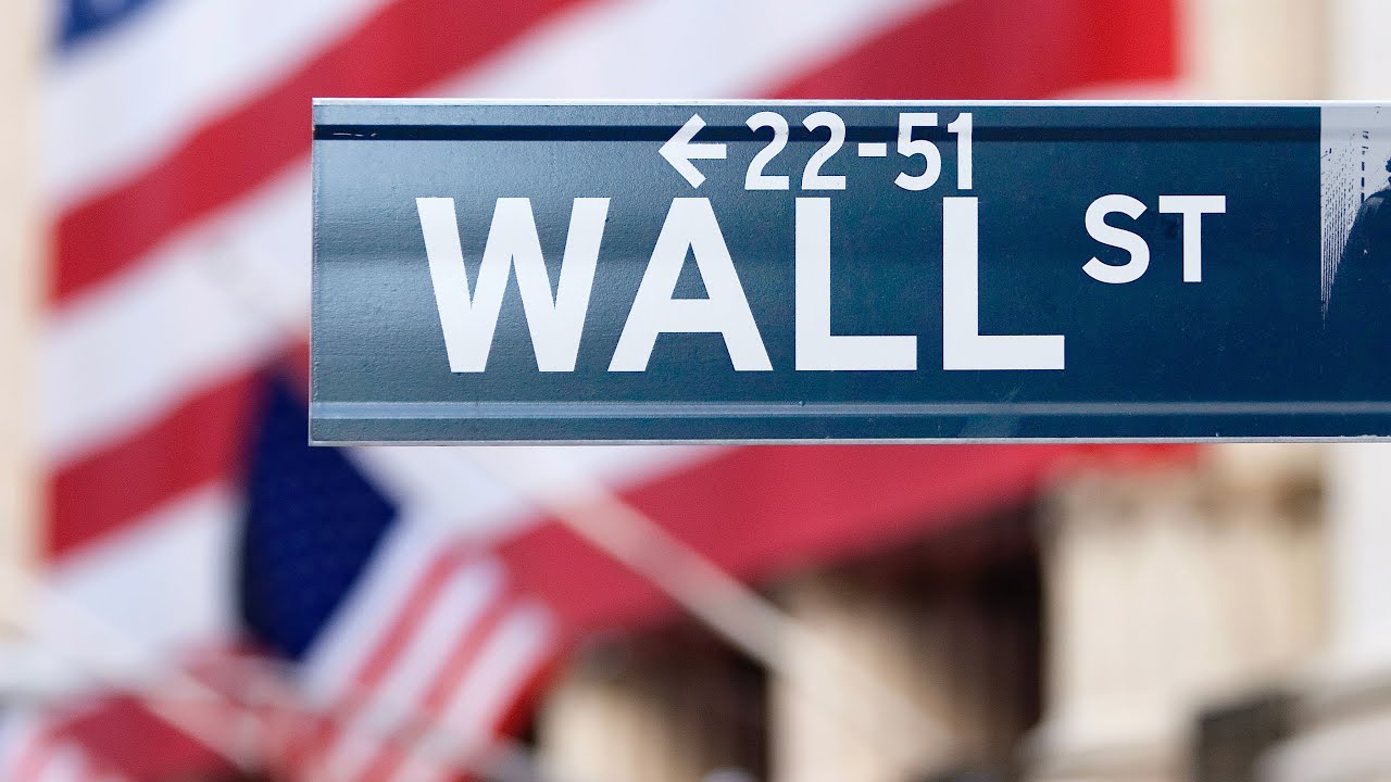 Stocks close higher after more market volatility as the Dow swings 500 points