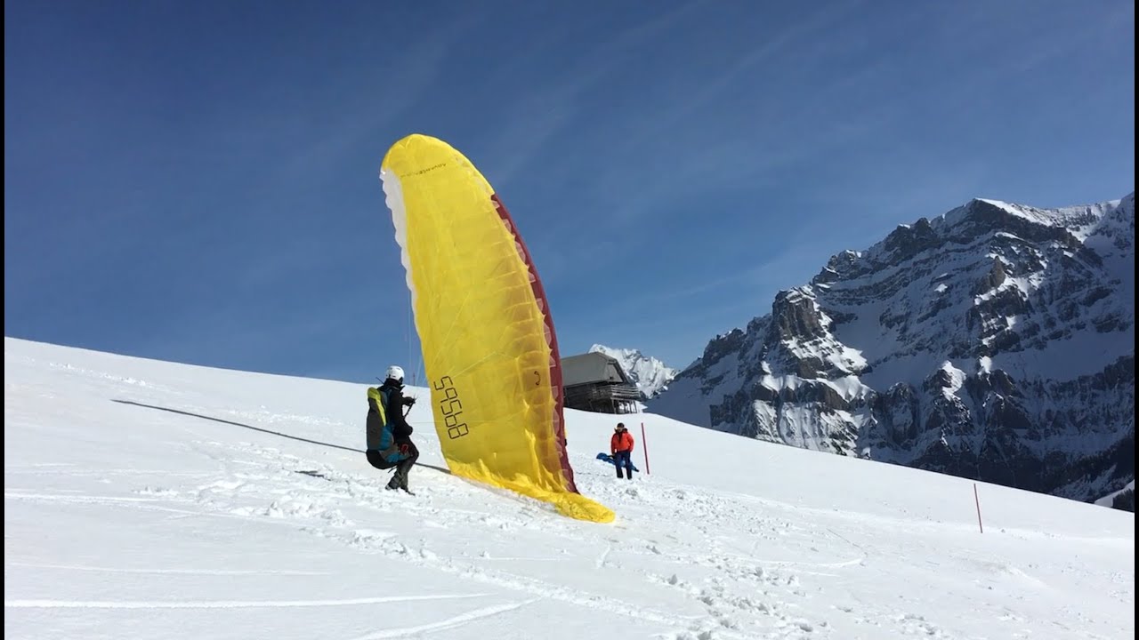Cloud 7: Paragliding students doing the cobra takeoff