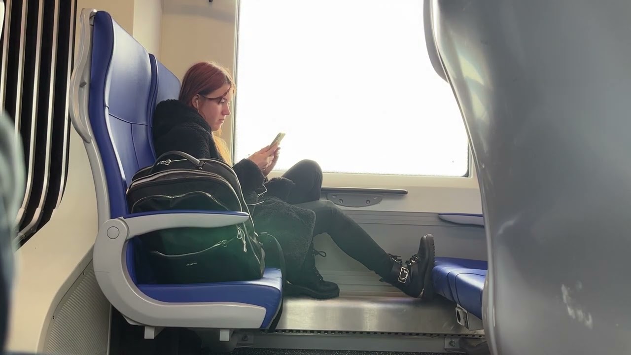 Boots on train seat