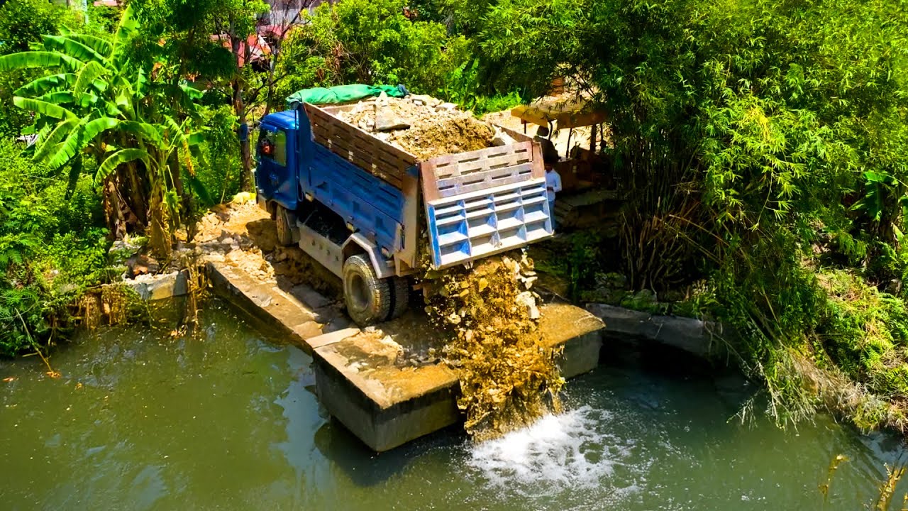 Incredible Project Landfill Flooded area Delete Pond !! Bulldozer D20P push Stone ,Truck 5Ton Spread