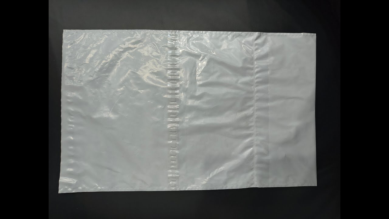 Automatic servo driving twin sealing  lip to lip flap POD courier bag making machine to Delhi India