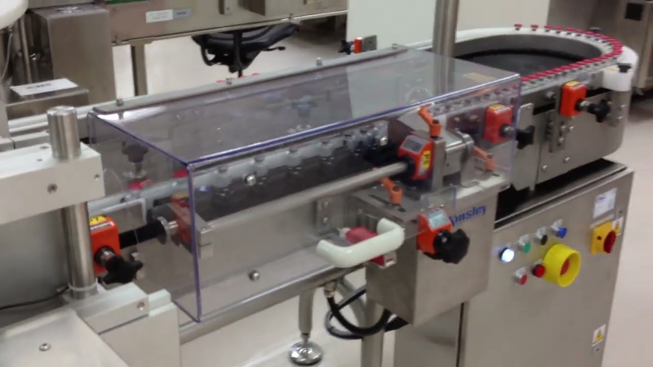 Noreside Vial Accumulating Separation & Inspection Conveyor System