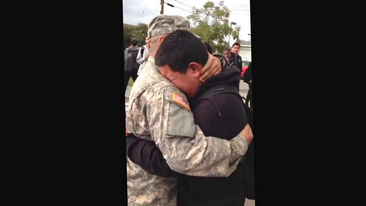A solider gives his little brother the surprise of his life