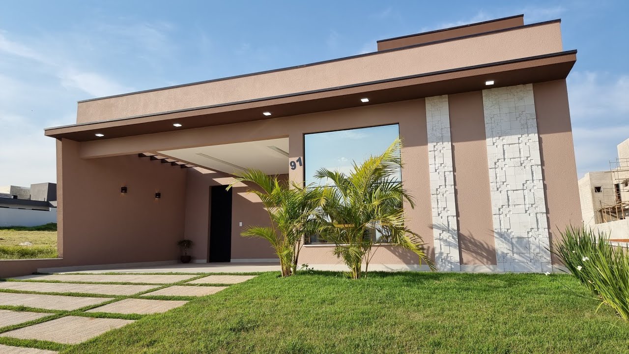 Casa térrea super integrada com área externa a venda. 3 dormitórios com ampla cozinha gourmet