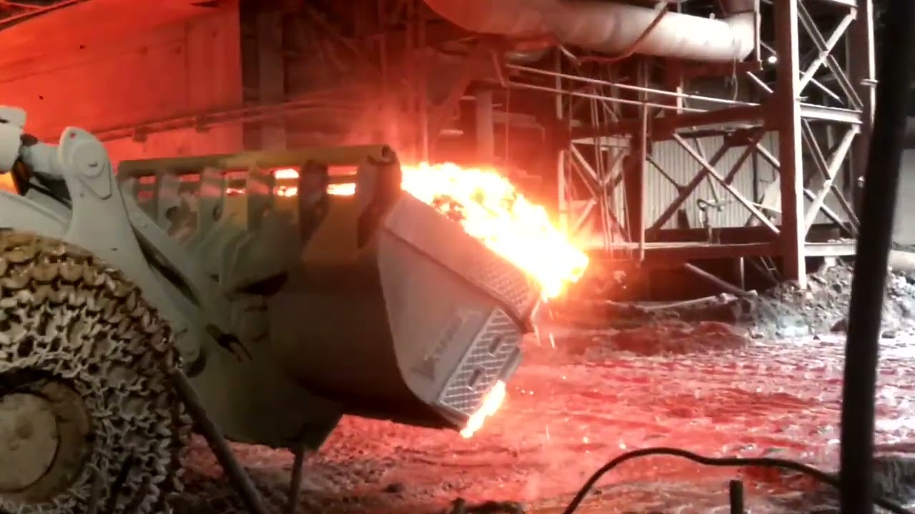 Hot Slag Remove From #slagpit through #catterpillar  #988  #steelmill #steel #stellar #cat