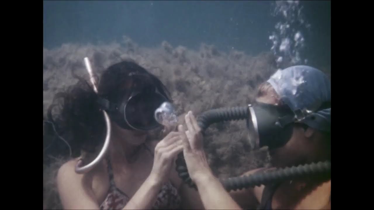 Vintage Scuba Diving Female Snorkeler meets Scuba Diver 1950s