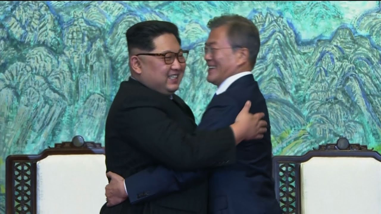 Raw: Kim and Moon Embrace After Talks