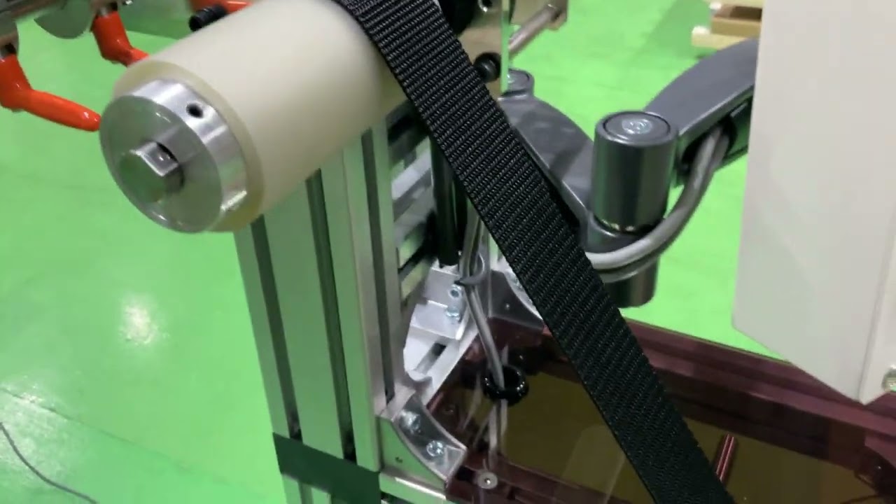 テープ２本同時タテ巻き取り機