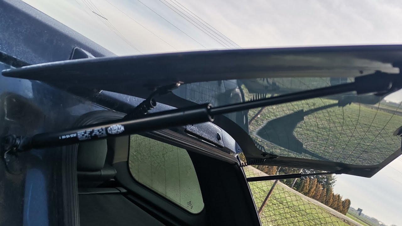 Wymiana włącznika zamka i siłowników tylnej szyby w Jeep Grand Cherokee WH/WK.