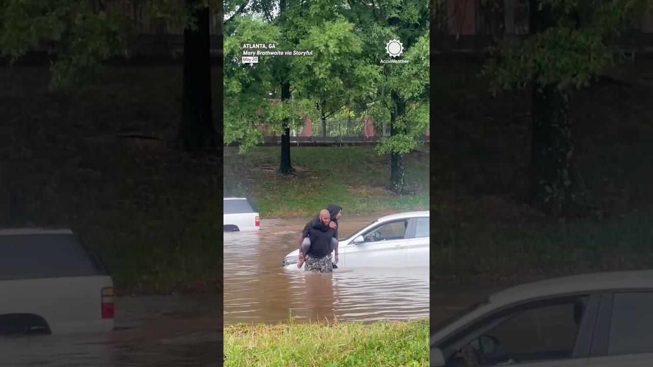 Brave Bystander Rescues Driver Trapped in Flood