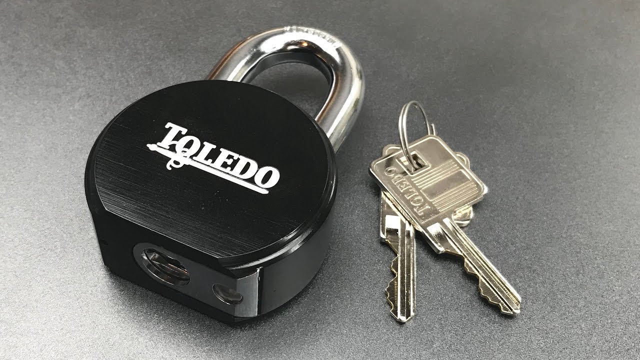 [674] Круглый навесной замок Toledo TBK90R вскрыт и выпотрошен