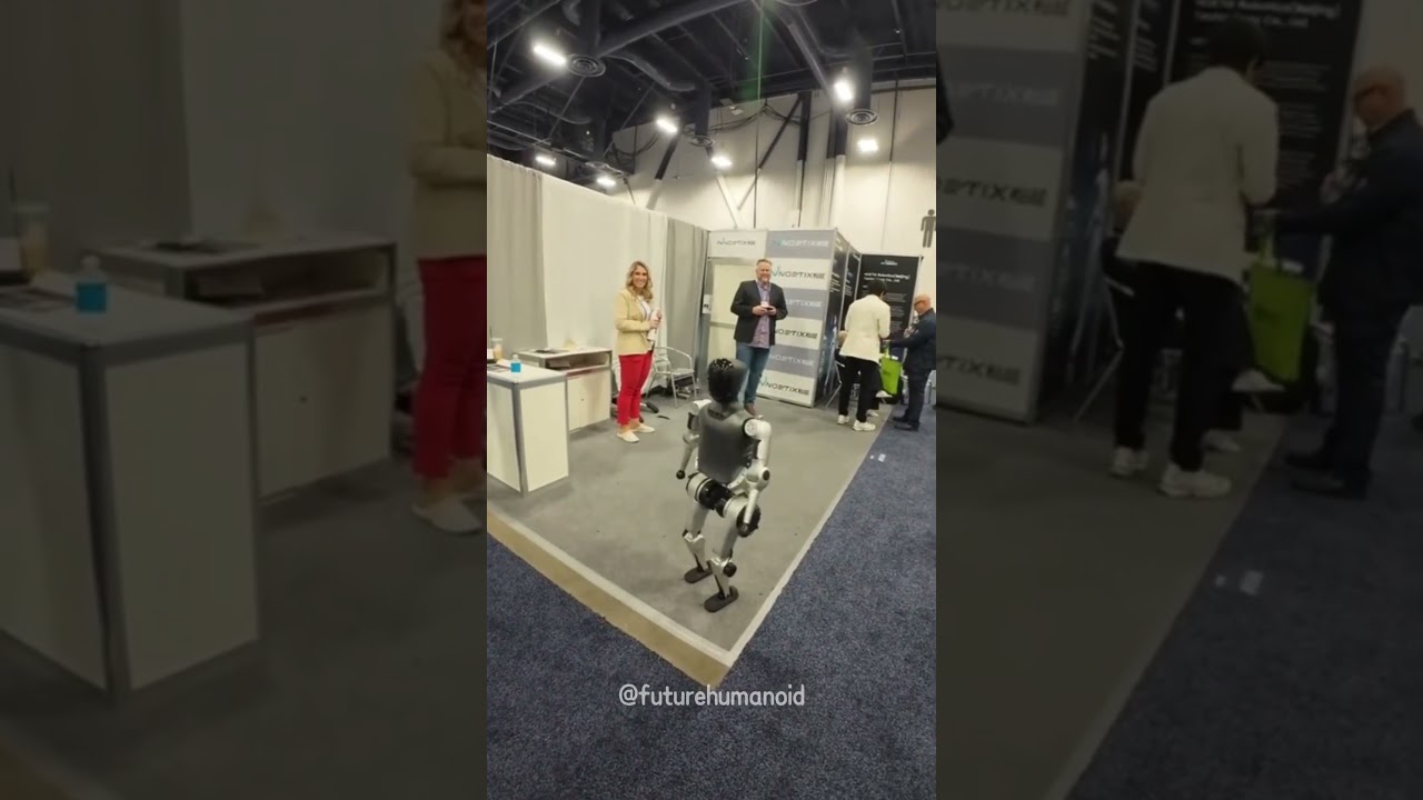 Humanoid Robot Joins a Selfie at Tech Expo 