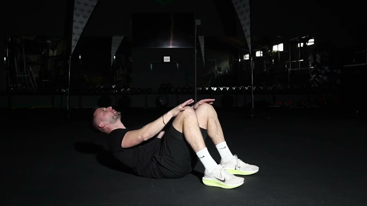 Knee Touch Crunches