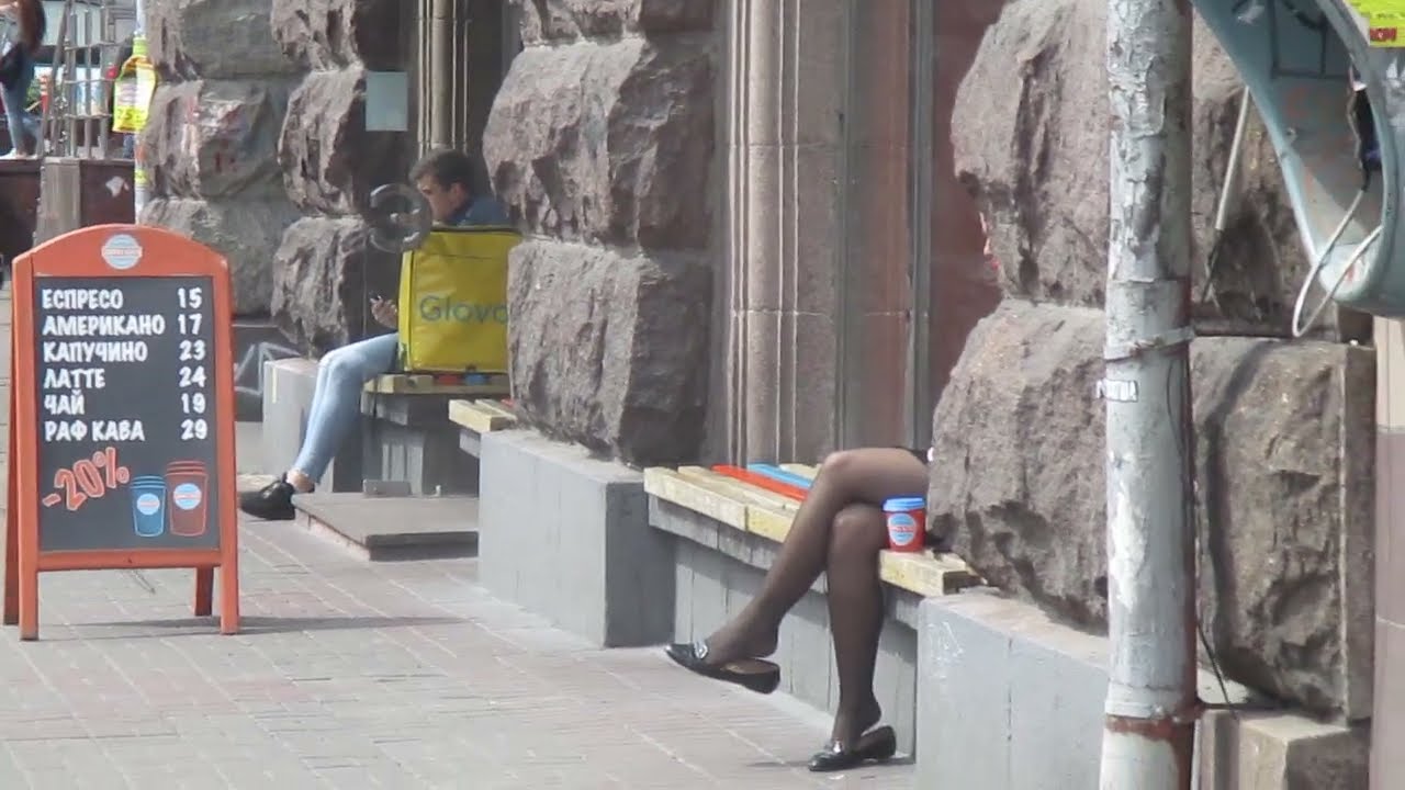 Shoe Dangling And Sexy Legs In Tights And Loafers