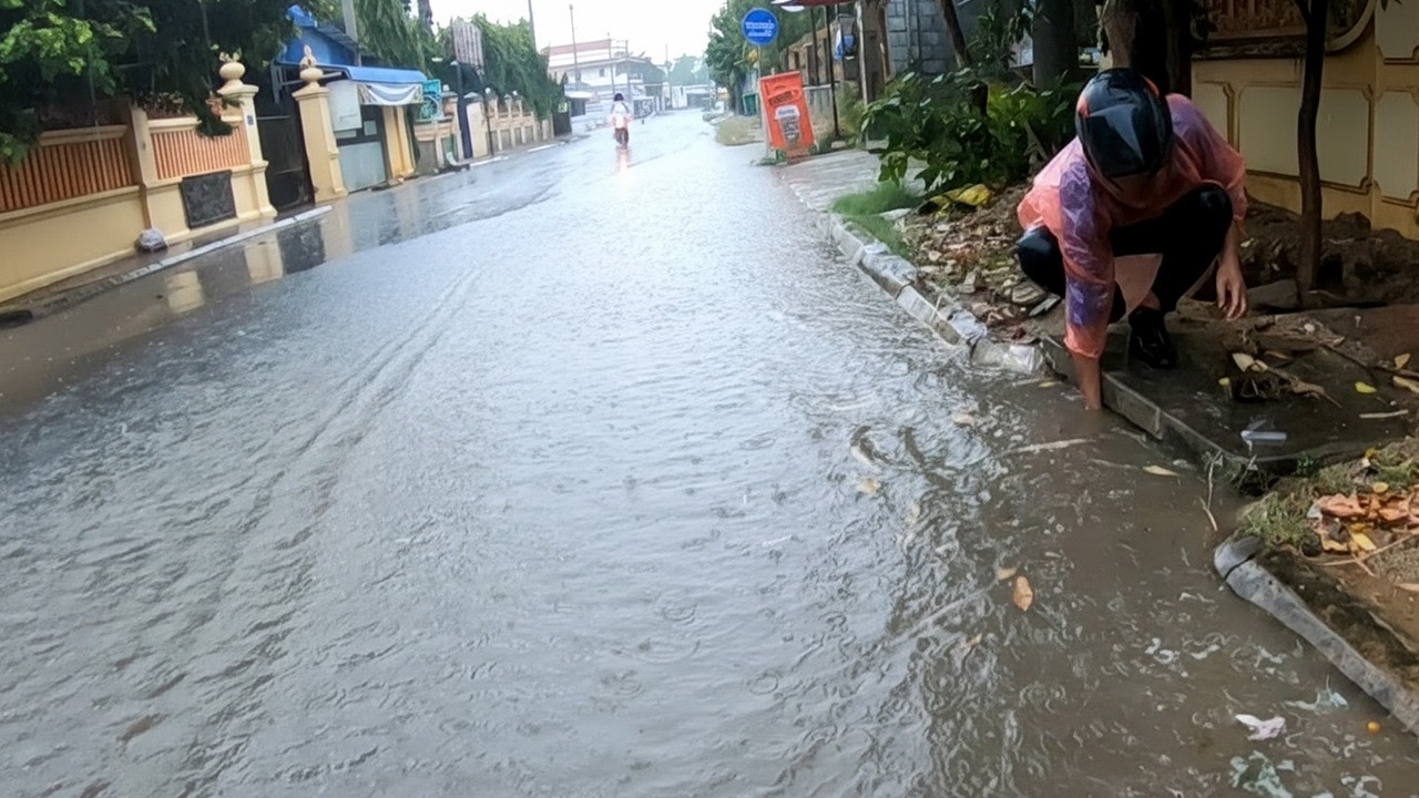 Drain Flood Rain On Street