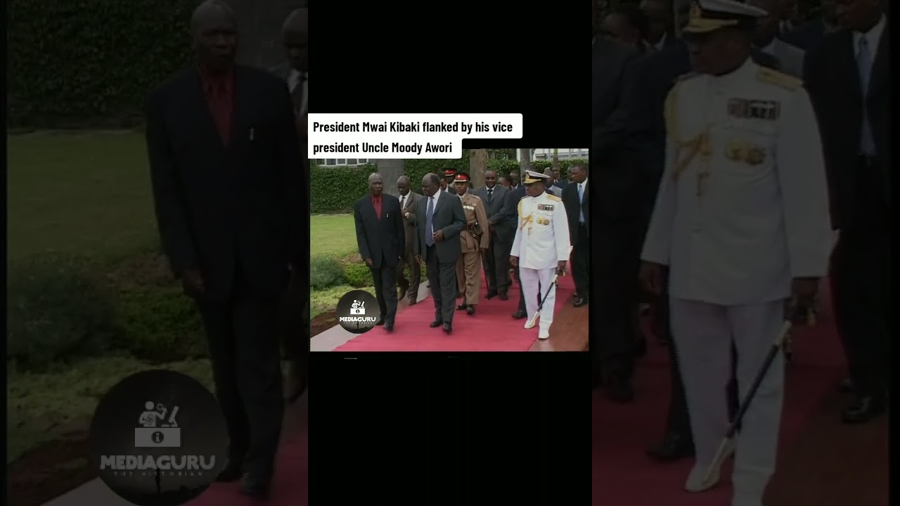 President Mwai Kibaki flanked by his vice president Uncle Moody Awori