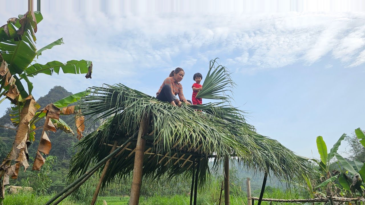 single mother and child make bamboo kitchen, fish and cook