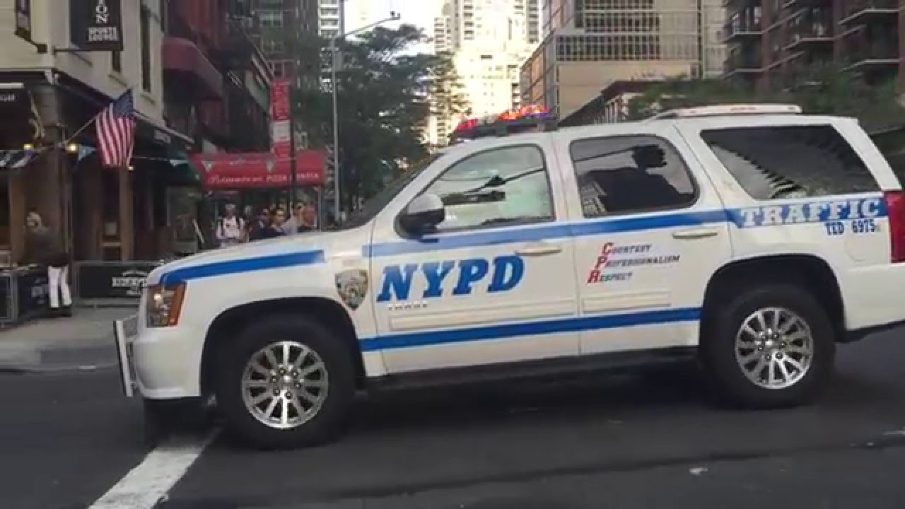 NYPD COMMANDING OFFICER USING PA SYSTEM TO GIVE ORDERS TO OFFICERS ON OBAMA MOTORCADE DUTY.