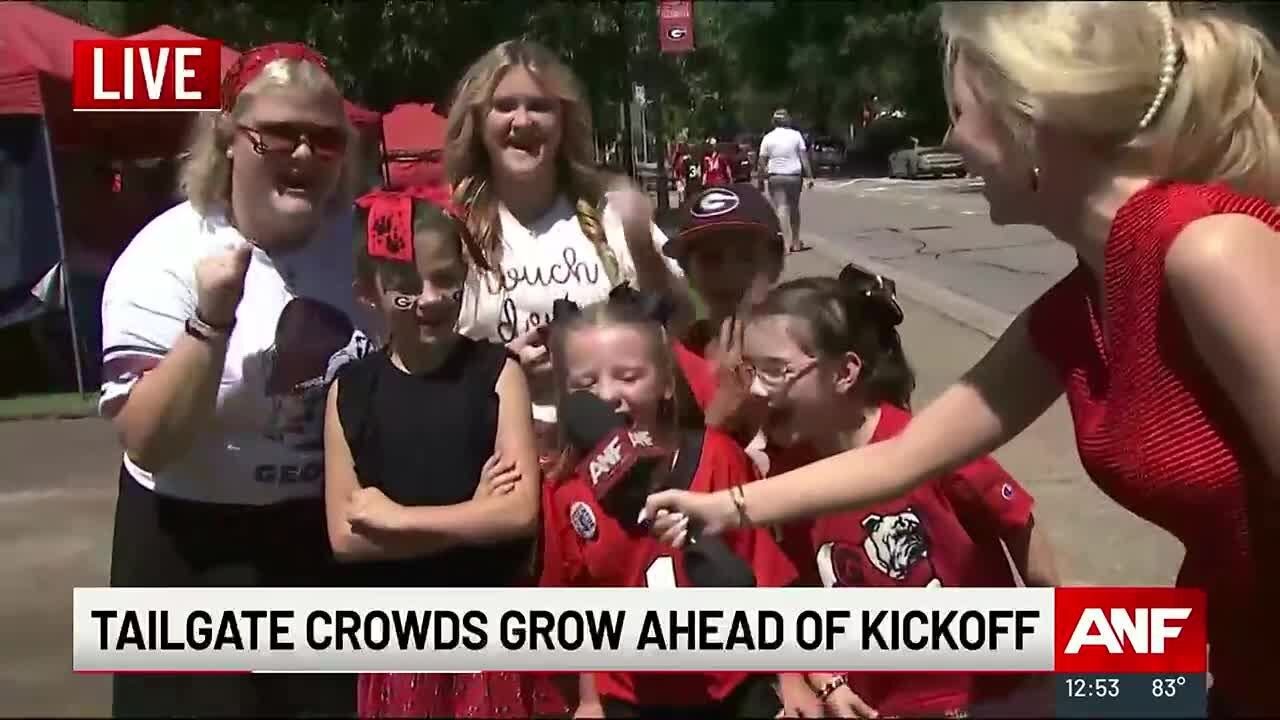 'GO DAWGS!' Tailgate crowds gather ahead of kickoff