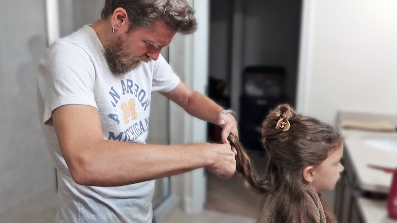 Dad Cuts Daughters Hair
