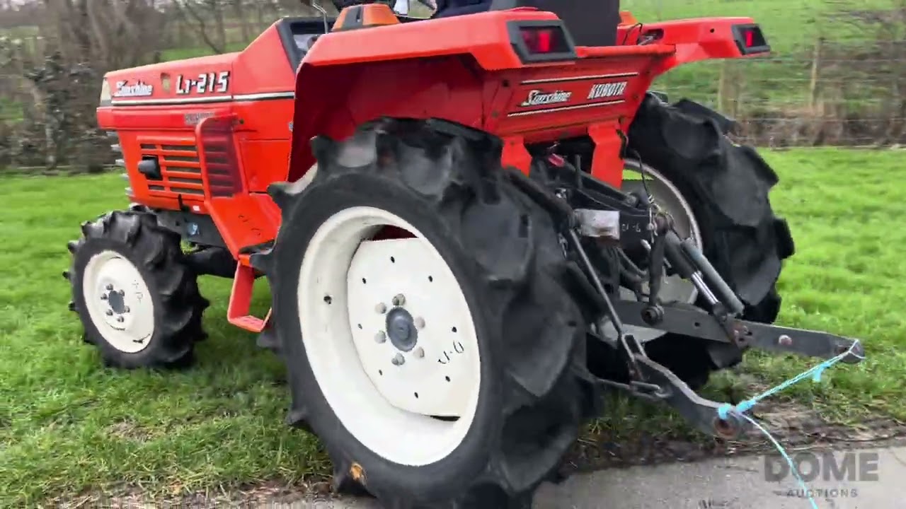 65 - Kubota Sunshine L1-215 four-wheel drive mini tractor