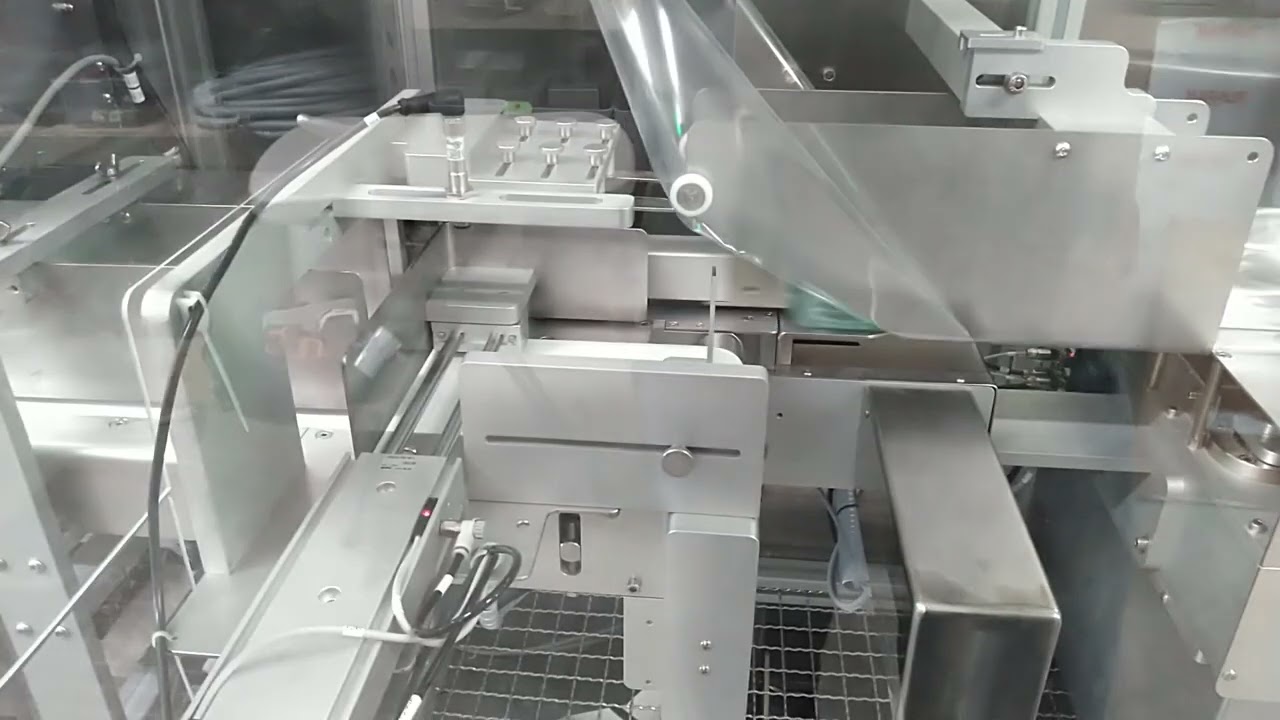 IQ-FLO Flow Wrapping Machines Automatically Triple Packaging 90mm plates!