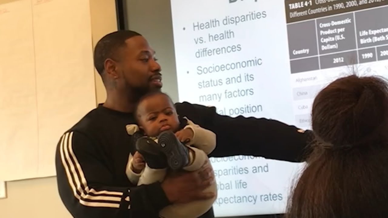 HBCU professor goes viral for holding student's baby during class