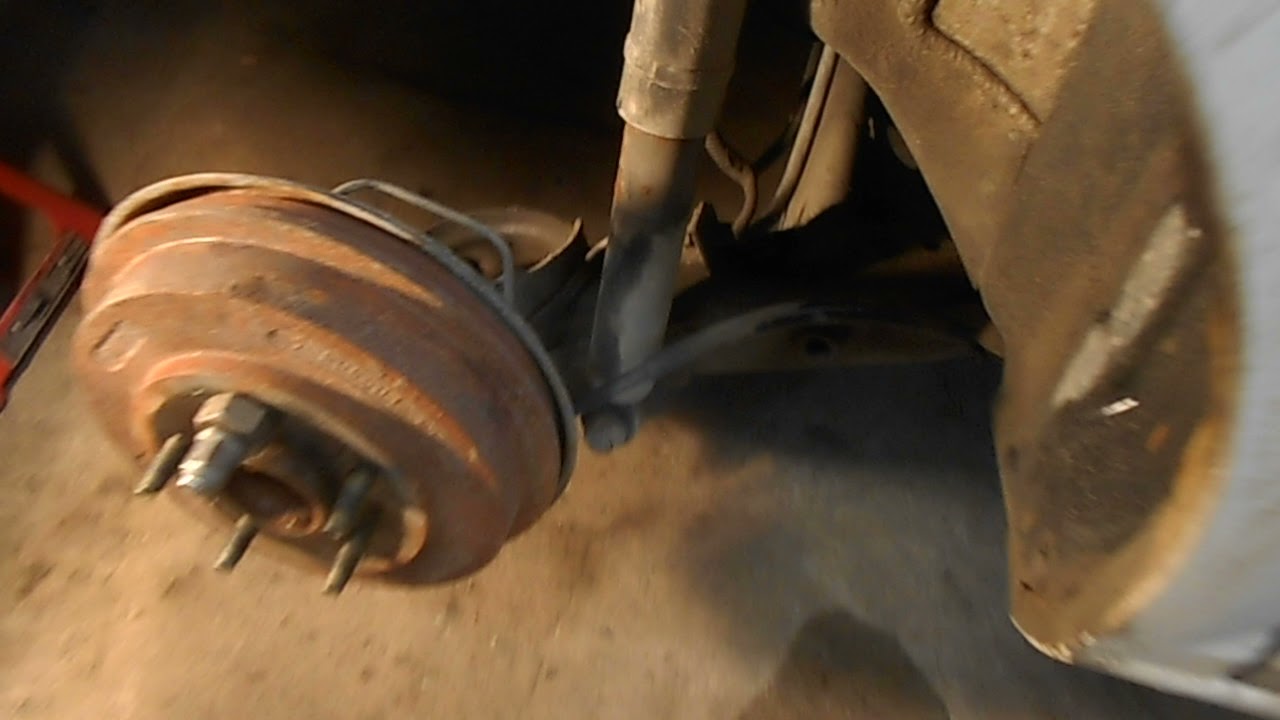 2010 Chev Cobalt rear coil spring replacement with a spring compressor.