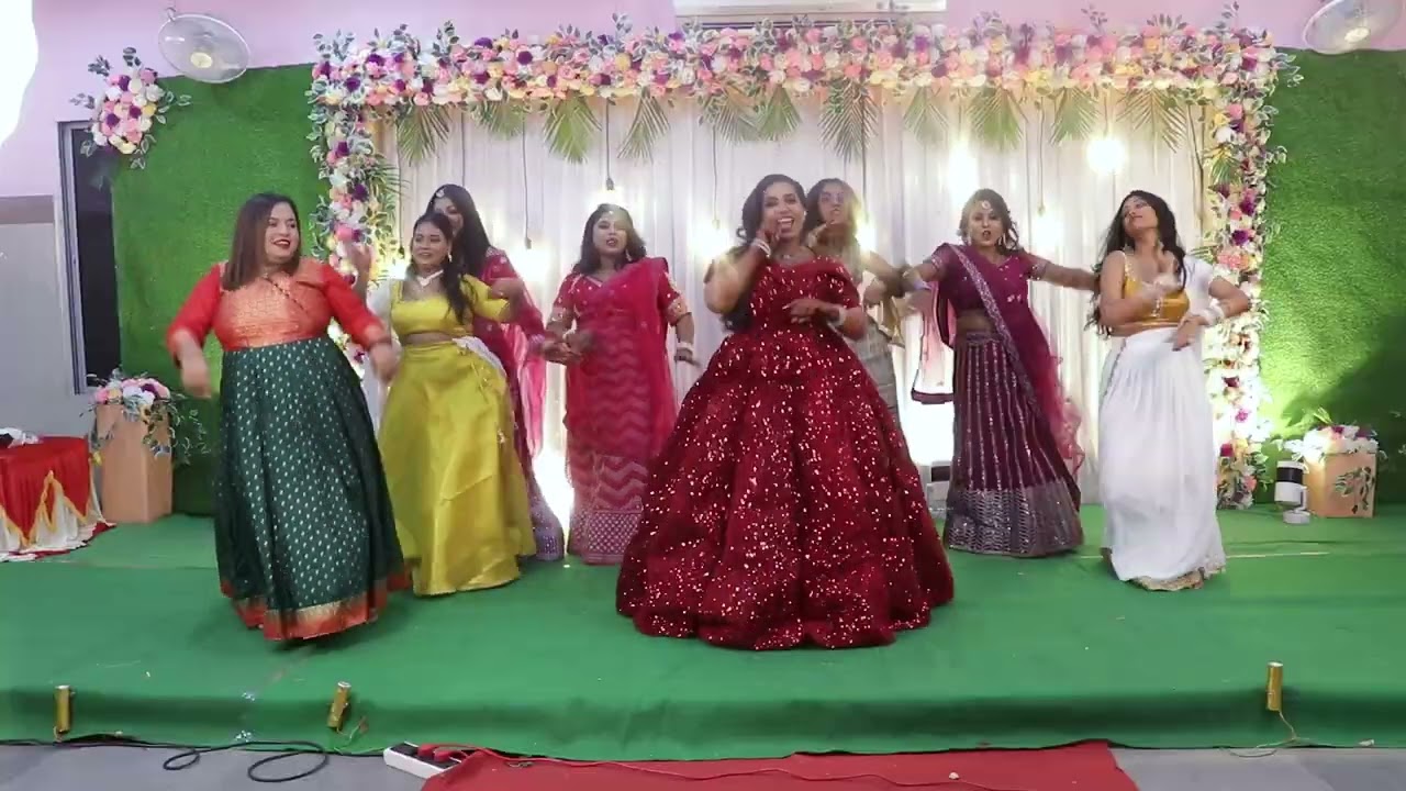 Cousins group dance with bride and groom