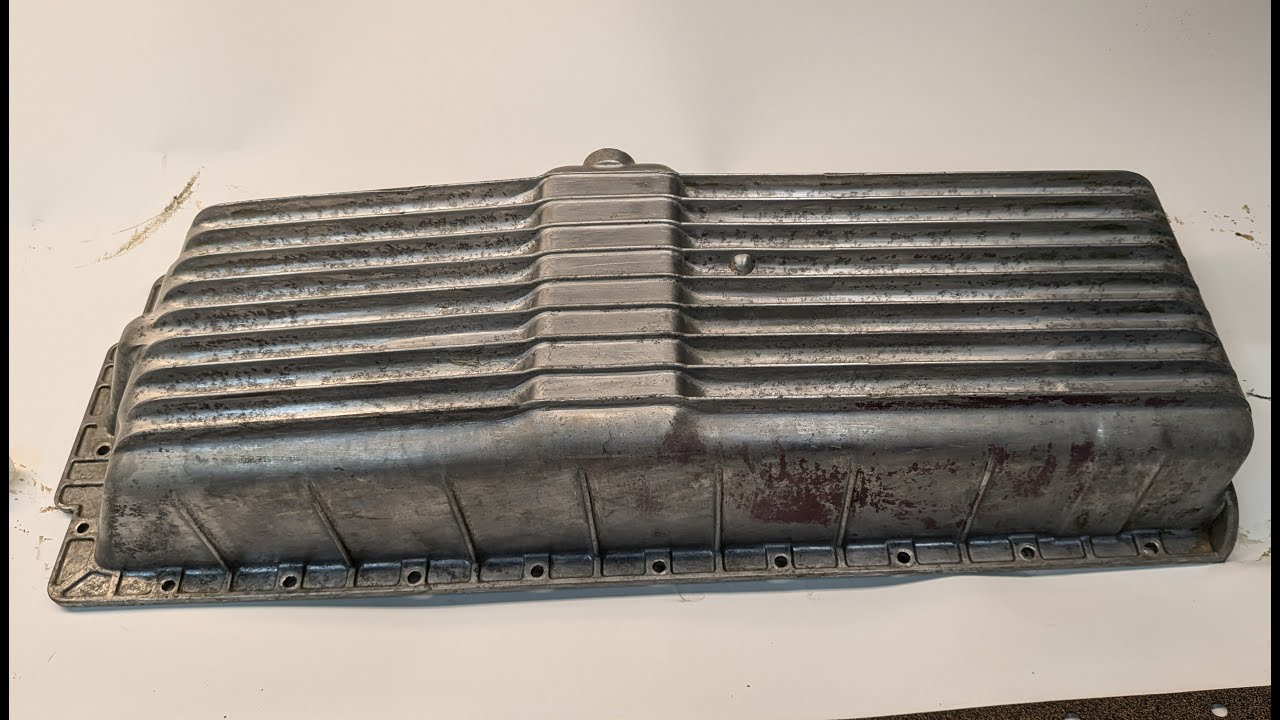 Removing the oil pan from a 1933 Auburn V12 Boat Tail Speedster