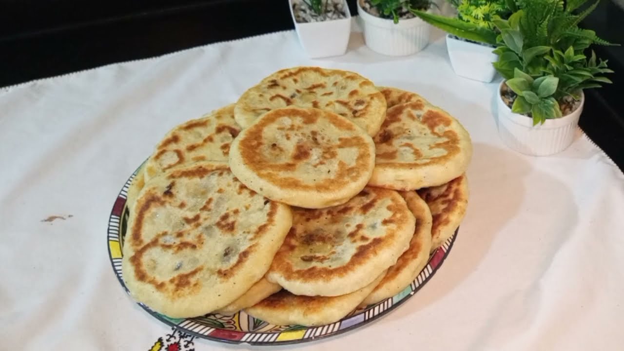 بطبوط معمر بالجبن 👌و الفرماج والزيتون كيجي رائع يستحق التجربه😋