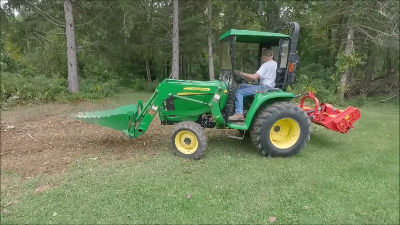 Removing stumps with stump bucket and flail mowing