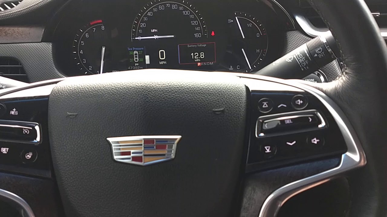 How to reset the oil change indicator in a Cadillac XTS