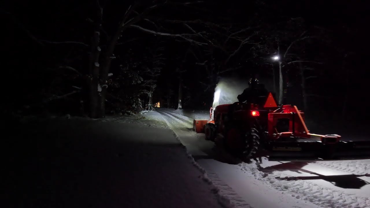 Blowing big snow in the National Forest with Kubota tractor.