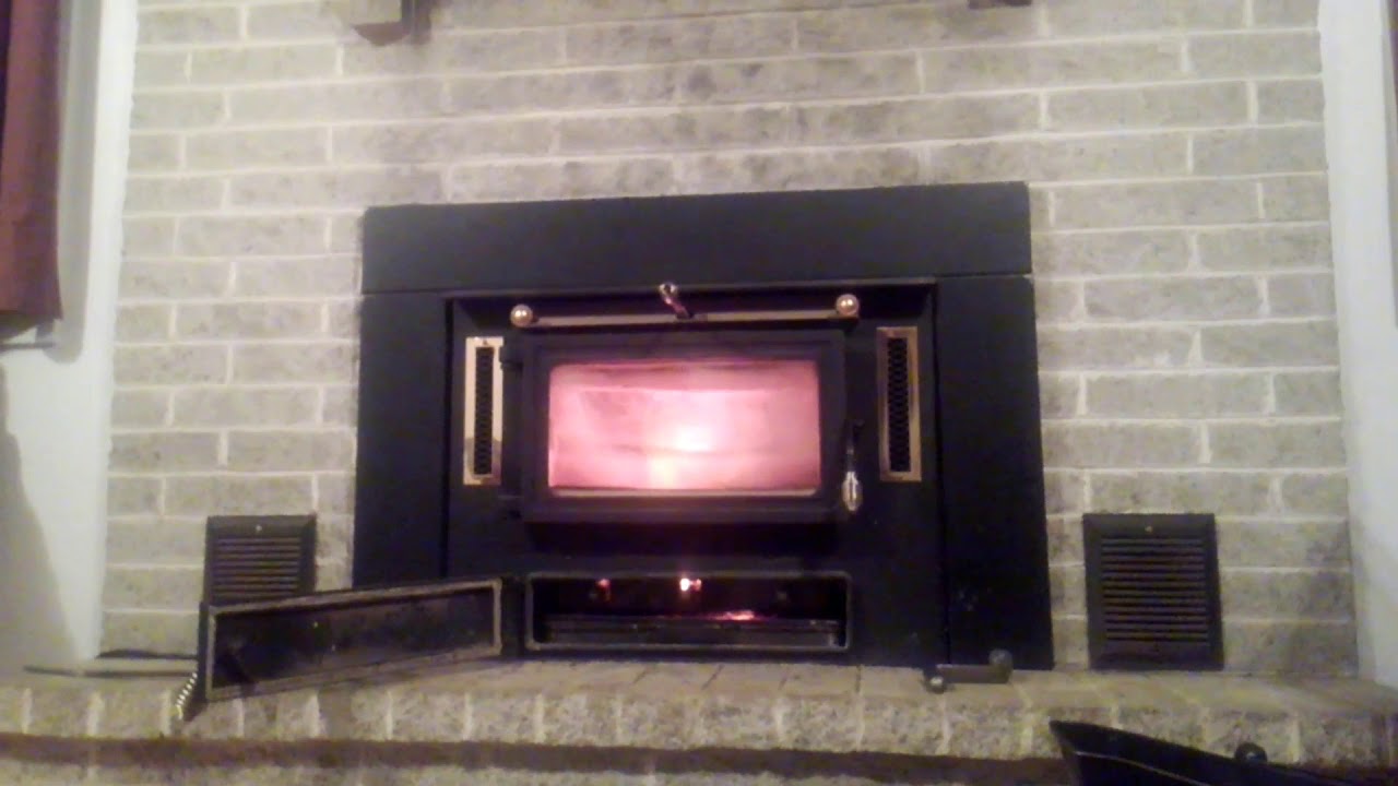 Tending the Hitzer Coal Stove